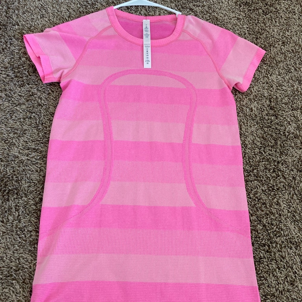 Lululemon pink tshirt.